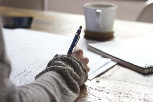 woman writing a journal