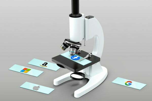 putting brand consistency under a microscope - white microscope with social media slides