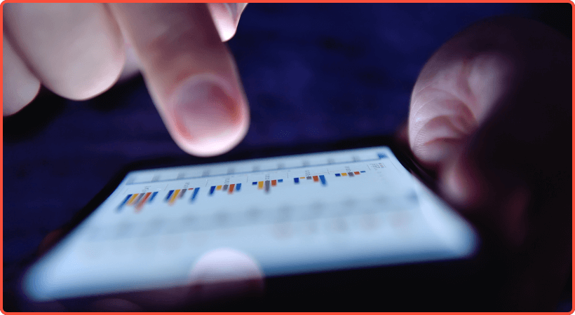 Person checking social media report numbers via a smartphone.
